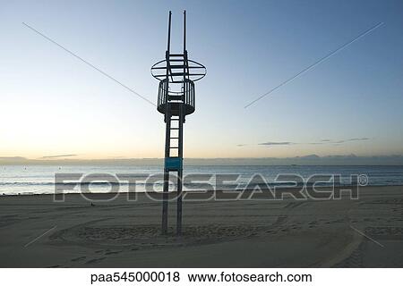Lifeguard chair on deserted beach View Large Photo Image Stock Photo - Lifeguard chair on deserted beach. Fotosearch