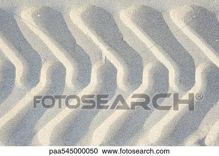 Tire tracks in sand, close-up View Large Photo Image Stock Image - Tire tracks in sand, close-up. Fotosearch