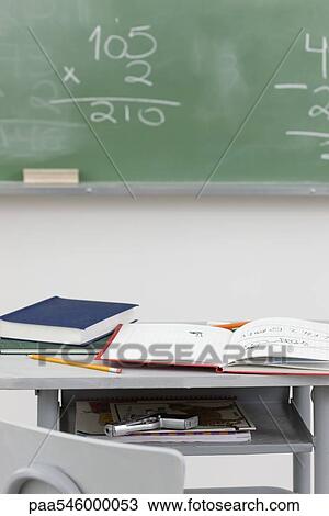 Handgun hidden in school desk View Large Photo Image Stock Image - Handgun hidden in school desk. Fotosearch