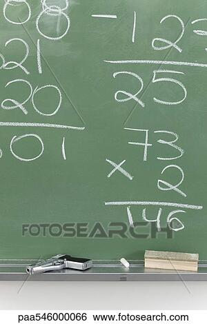 Handgun next to blackboard in classroom View Large Photo Image Stock Photograph - Handgun next to blackboard in classroom. Fotosearch