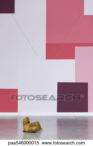 Teddy bear lying on floor View Large Photo Image Stock Photography - Teddy bear lying on floor. Fotosearch