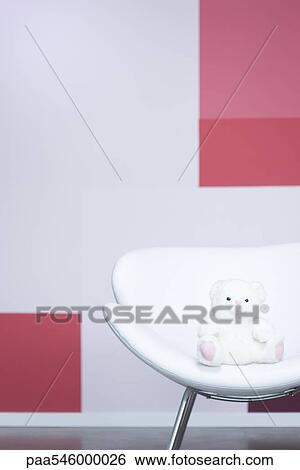Teddy bear sitting on armchair View Large Photo Image Stock Photograph - Teddy bear sitting on armchair. Fotosearch