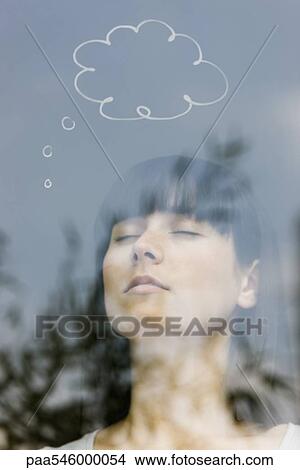 Young woman with thought bubble over head View Large Photo Image Picture - Young woman with thought bubble over head. Fotosearch
