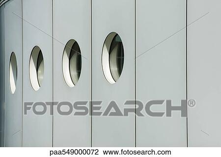 Circular windows on building facade View Large Photo Image Stock Image - Circular windows on building facade. Fotosearch