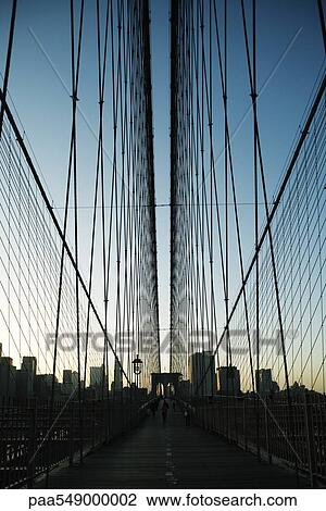 Stock Image - "Elevated pedestrian walkway above Brooklyn Bridge, New York City". Fotosearch