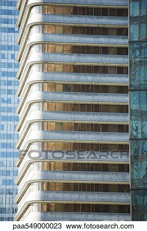 Stock Image - "High rise office buildings side by side, cropped". Fotosearch