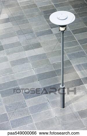 Stock Photograph - Lamp post in city square. Fotosearch