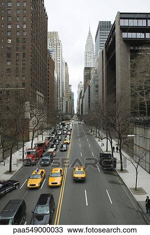 "Traffic on busy city street, high angle view" View Large Photo Image Stock Image - "Traffic on busy city street, high angle view". Fotosearch