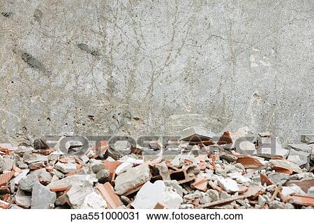 "Construction rubble, broken bricks, pieces of concrete against wall" View Large Photo Image Stock Image - "Construction rubble, broken bricks, pieces of concrete against wall". Fotosearch
