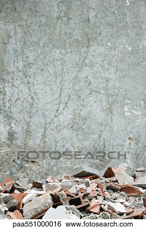 "Construction rubble, broken bricks, pieces of concrete against wall" View Large Photo Image Stock Photograph - "Construction rubble, broken bricks, pieces of concrete against wall". Fotosearch