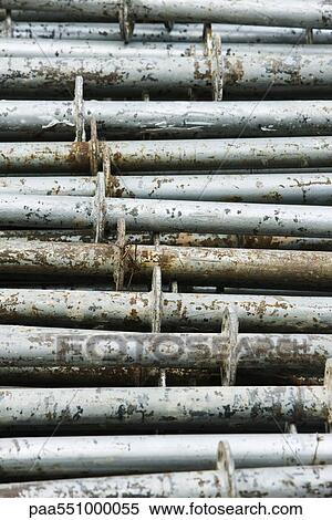 "Metal scaffolding stacked, detail" View Large Photo Image Stock Photography - "Metal scaffolding stacked, detail". Fotosearch