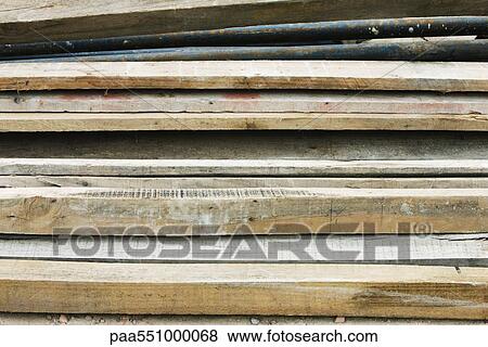 "Pile of wooden planks, close-up" View Large Photo Image Stock Photo - "Pile of wooden planks, close-up". Fotosearch