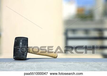 Rubber mallet on ledge View Large Photo Image Stock Photo - Rubber mallet on ledge. Fotosearch