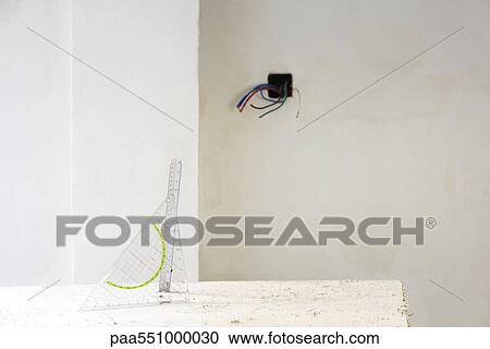 "Set square, ruler on table in unfinished room" View Large Photo Image Stock Image - "Set square, ruler on table in unfinished room". Fotosearch