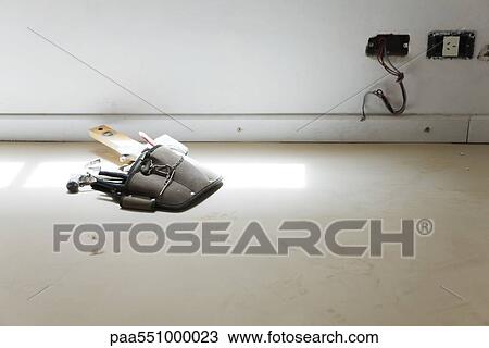 "Tool belt with hammer, level on floor, electric wires sticking out from unfinished socket" View Large Photo Image Stock Image - "Tool belt with hammer, level on floor, electric wires sticking out from unfinished socket". Fotosearch