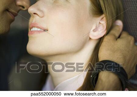 "Young couple touching noses, man caressing woman's hair, cropped" View Large Photo Image Stock Image - "Young couple touching noses, man caressing woman's hair, cropped". Fotosearch