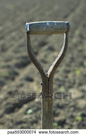 Wooden handle of shovel View Large Photo Image Picture - Wooden handle of shovel. Fotosearch