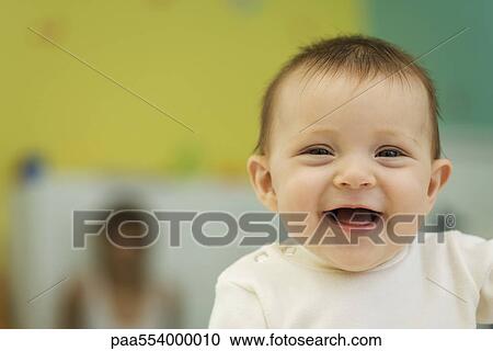 Laughing baby, portrait View Large Photo Image Stock Image - Laughing baby, portrait. Fotosearch