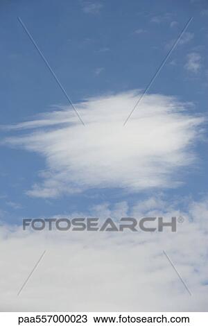 Blue sky with clouds View Large Photo Image Stock Image - Blue sky with clouds. Fotosearch