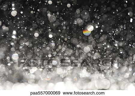 Defocused water droplets View Large Photo Image Stock Photo - Defocused water droplets. Fotosearch