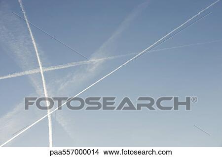 Vapor trails in sky View Large Photo Image Picture - Vapor trails in sky. Fotosearch