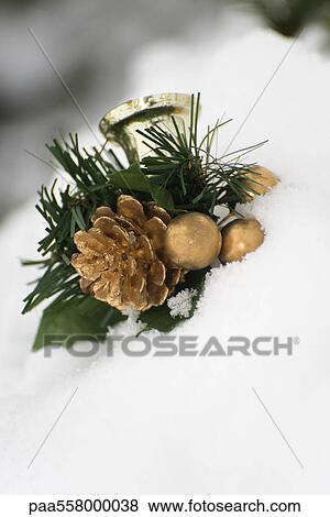 Christmas decoration fallen on snow View Large Photo Image Stock Photo - Christmas decoration fallen on snow. Fotosearch