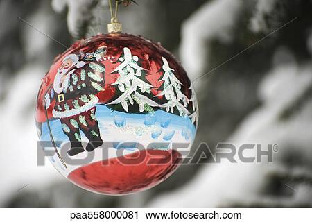 Colorful Christmas ornament hanging from branch View Large Photo Image Stock Image - Colorful Christmas ornament hanging from branch. Fotosearch
