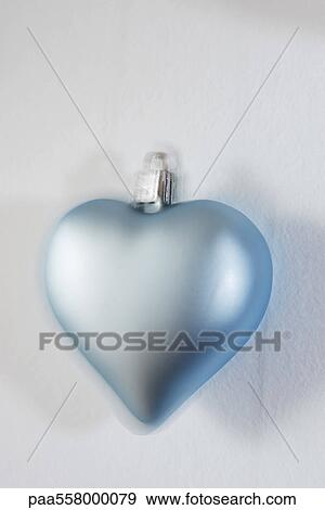 Heart shaped Christmas ornament, close-up View Large Photo Image Stock Photo - Heart shaped Christmas ornament, close-up. Fotosearch