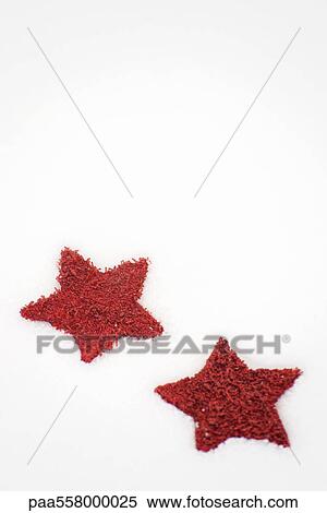 Red stars placed on snow View Large Photo Image Stock Photography - Red stars placed on snow. Fotosearch