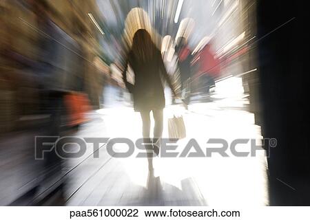 Pedestrian walking, rear view, blurred View Large Photo Image Stock Image - Pedestrian walking, rear view, blurred. Fotosearch