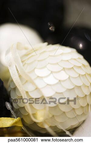 White sequined Christmas ornaments View Large Photo Image Stock Image - White sequined Christmas ornaments. Fotosearch