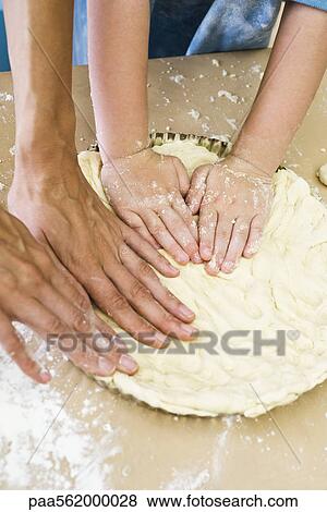 Mother and child making pie crust together, cropped view View Large Photo Image Stock Photo - Mother and child making pie crust together, cropped view. Fotosearch