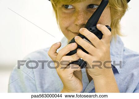Picture - Boy with walkie-talkie. Fotosearch