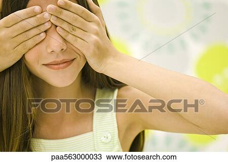 Girl covering eyes with hands View Large Photo Image Stock Image - Girl covering eyes with hands. Fotosearch