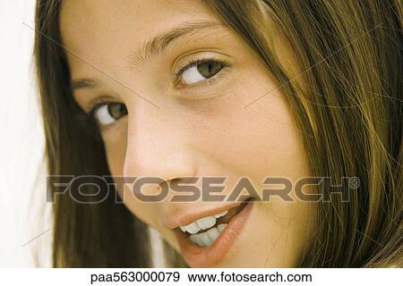 Girl glancing sideways at camera, portrait View Large Photo Image Stock Photo - Girl glancing sideways at camera, portrait. Fotosearch