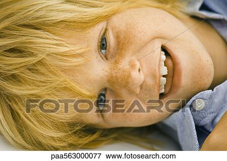 Little boy smiling, portrait View Large Photo Image Stock Photo - Little boy smiling, portrait. Fotosearch