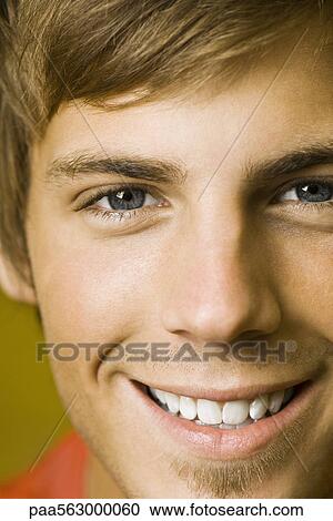 Young man, close-up portrait View Large Photo Image Stock Image - Young man, close-up portrait. Fotosearch