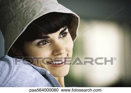 Woman looking away dreamily View Large Photo Image Stock Image - Woman looking away dreamily. Fotosearch