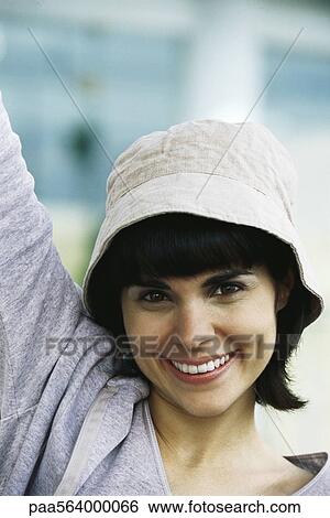 Stock Photograph - Woman smiling with vitality, portrait. Fotosearch