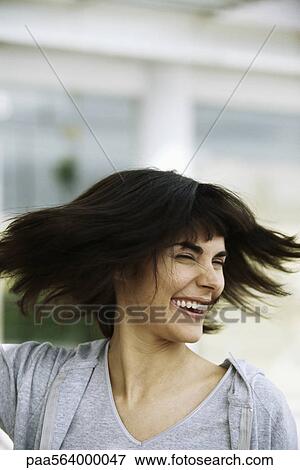Woman tossing hair, portrait View Large Photo Image Stock Photo - Woman tossing hair, portrait. Fotosearch