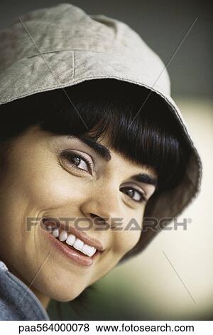 Woman wearing hat, smiling, portrait View Large Photo Image Stock Photo - Woman wearing hat, smiling, portrait. Fotosearch
