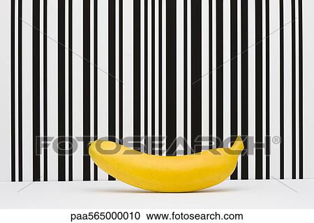 Stock Image - Food concept, banana in front of bar code. Fotosearch