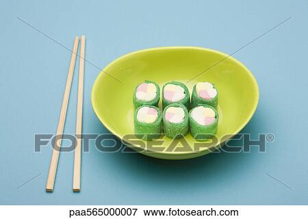 Stock Photo - Food concept, candy rolled to look like maki rolls. Fotosearch