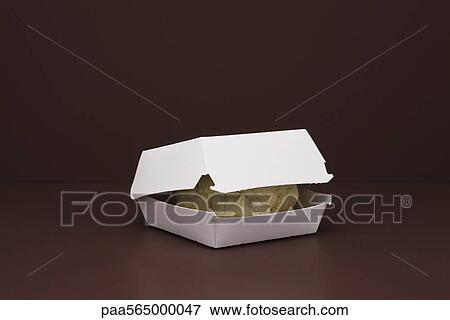 Stock Photo - Food concept, fresh cauliflower inside fast food container. Fotosearch