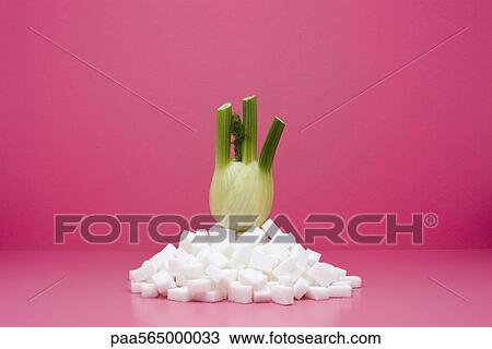 Food concept, fresh fennel on top of pile of sugar cubes View Large Photo Image Stock Image - Food concept, fresh fennel on top of pile of sugar cubes. Fotosearch