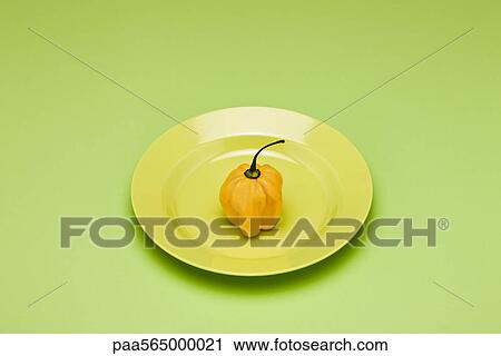 Food concept, fresh yellow bell pepper on plate View Large Photo Image Stock Image - Food concept, fresh yellow bell pepper on plate. Fotosearch