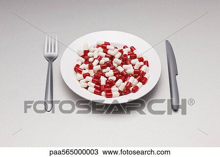 Food concept, plate full of pills View Large Photo Image Stock Image - Food concept, plate full of pills. Fotosearch