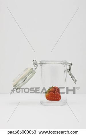 Food concept, single fresh strawberry in glass gar View Large Photo Image Stock Image - Food concept, single fresh strawberry in glass gar. Fotosearch