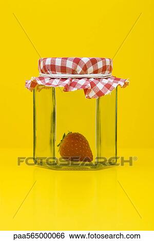 Food concept, single fresh strawberry inside of glass jar View Large Photo Image Stock Photograph - Food concept, single fresh strawberry inside of glass jar. Fotosearch