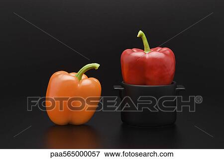 Fresh bell peppers, one in miniature pot View Large Photo Image Stock Photo - Fresh bell peppers, one in miniature pot. Fotosearch